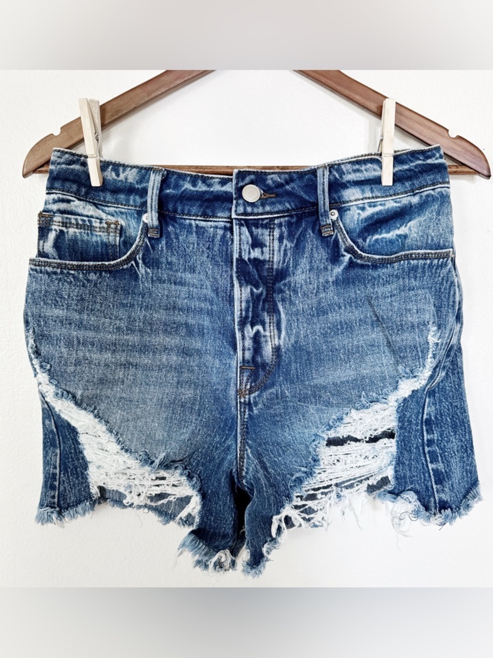 Good American Medium Blue Denim Shorts with Distressed Detailing 4/27